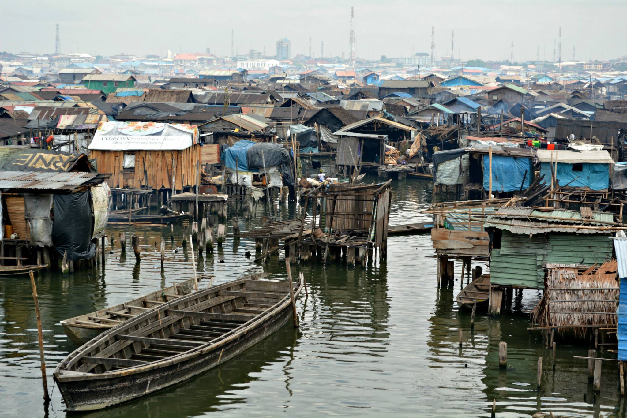 Canoe in water at sunset